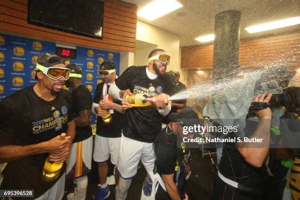 JaVale McGee of the Golden State Warriors celebrates in the locker room after winning the NBA Championsip in Game Five of the 2017 NBA Finals against...