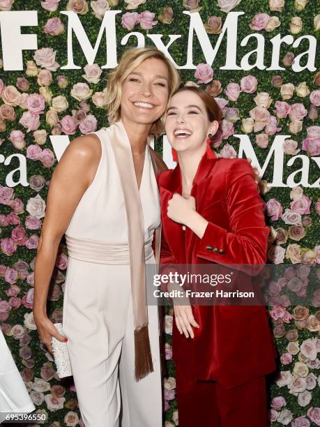 Host Nicola Maramotti, wearing Max Mara honoree Zoey Deutch, wearing Max Mara, at Max Mara Celebrates Zoey Deutch - The 2017 Women In Film Max Mara...