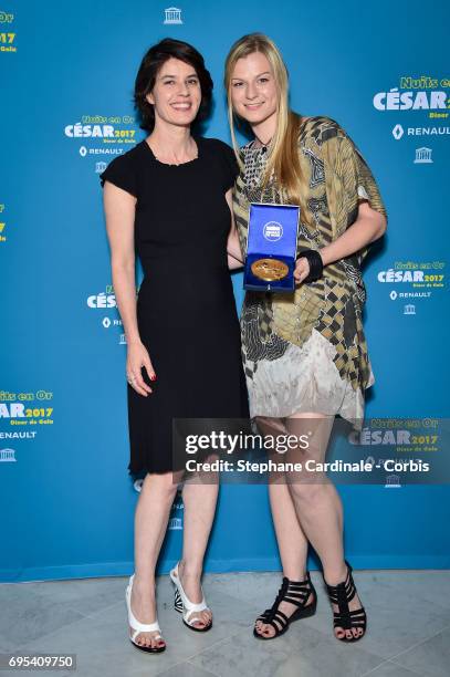 Irene Jacob and Austeja Urbaite attend 'Les Nuits en Or 2017' Dinner Gala, at Unesco on June 12, 2017 in Paris, France.