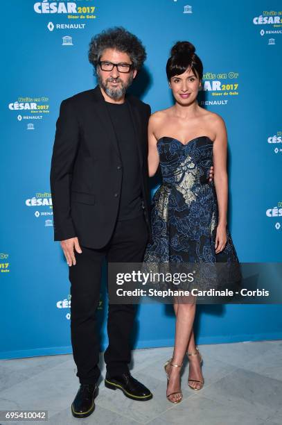 Radu Mihaileanu and Amel Chahbi attend 'Les Nuits en Or 2017' Dinner Gala, at Unesco on June 12, 2017 in Paris, France.