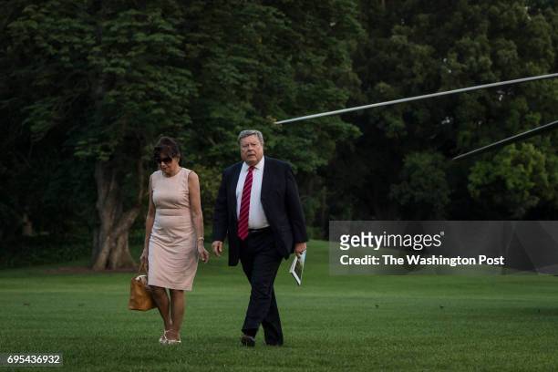 Amalija Knavs and Viktor Knavs, parents of first lady Melania Trump walk from Marine One across the South Lawn as they return from Bedminster, N.J....