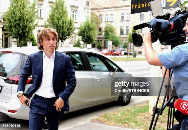 Real Madrid's midfielder Luka Modric arrives at the Osijek courthouse on June 13, 2017 to testify in a multi-million-euro corruption trial against...