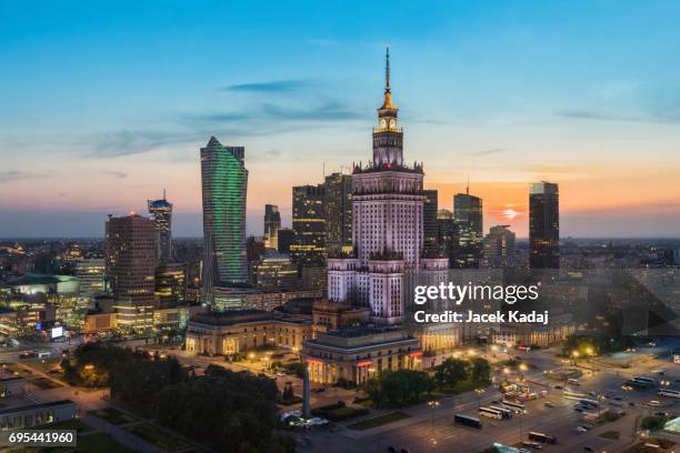 sunset over warsaw - warsaw stock-fotos und bilder