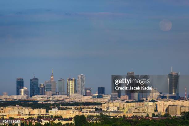 moonrise over warsaw city - warsaw panorama stock pictures, royalty-free photos & images