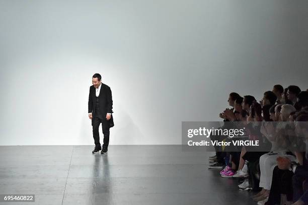 Fashion designer Songzio walks the runway at the SONGZIO fashion show during the London Fashion Week Men's June 2017 Spring Summer 2018 collections...