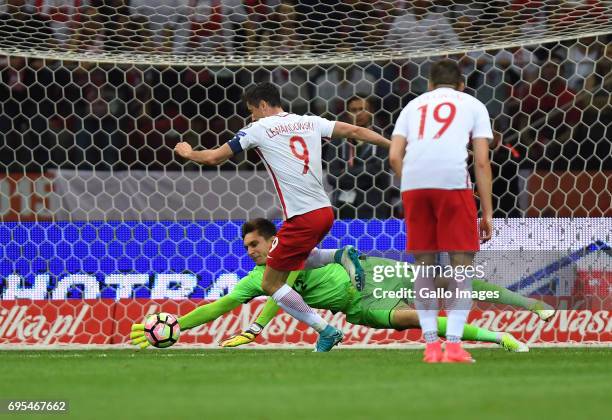 Ciprian Tatarusanu of Romania saves the Robert Lewandowski of Poland shot during the 2018 FIFA World Cup Russia eliminations match between Poland and...