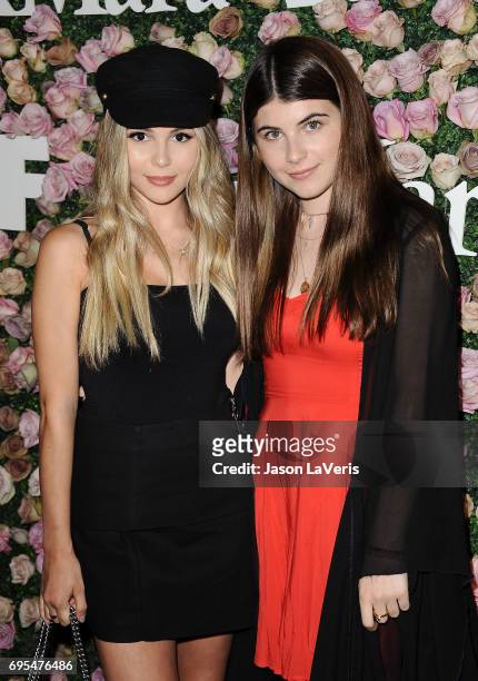 Olivia Jade Giannulli and Bella Giannulli attend Max Mara and Vanity Fair's celebration of Women In Film's Face of the Future Award recipient, Zoey...