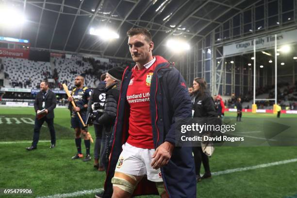 Dejected Sam Warburton of the Lions walks off the pitch following his team's 23-22 defeat during the 2017 British & Irish Lions tour match between...