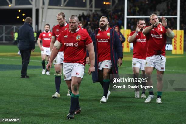 Dejected Lions players walk off the pitch following their 23-22 defeat during the 2017 British & Irish Lions tour match between the Highlanders and...