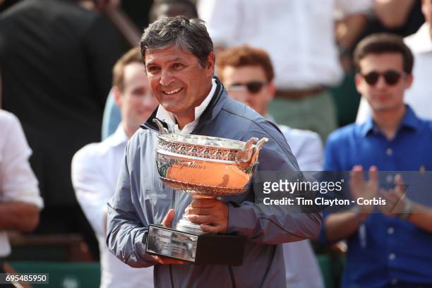 French Open Tennis Tournament - Day Fifteen. Uncle Toni Nadal brings out the trophy in honor of Rafael Nadal of Spain's tenth Round Garros Men's...