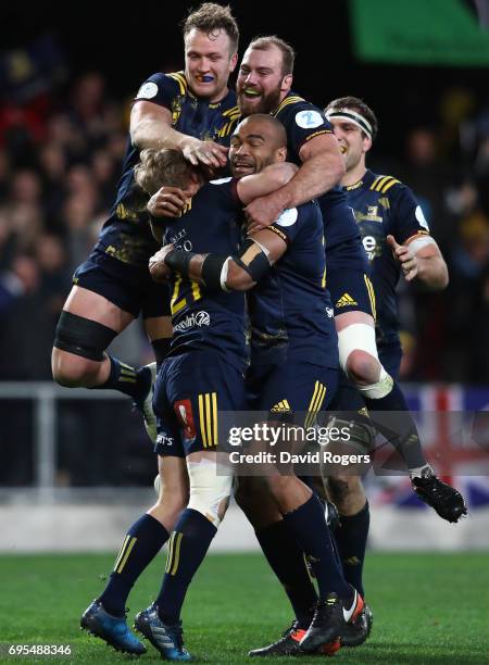 Highlanders players celebrate their team's 23-22 victory during the 2017 British & Irish Lions tour match between the Highlanders and the British &...