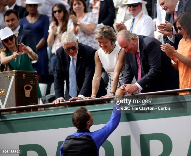 French Open Tennis Tournament - Day Fifteen. Rafael Nadal of Spain is congratulated by Juan Carlos of Spain after defeating Stan Wawrinka of...