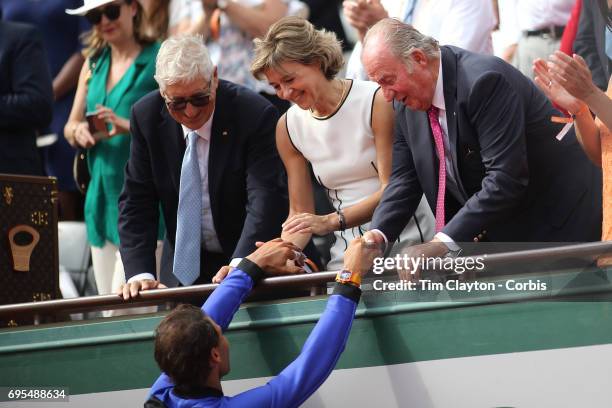 French Open Tennis Tournament - Day Fifteen. Rafael Nadal of Spain is congratulated by Juan Carlos of Spain after defeating Stan Wawrinka of...