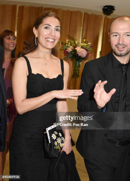 Caterina Murino and Alessandro Capitani attend 'Les Nuits en Or 2017' Dinner Gala - Photocall at UNESCO on June 12, 2017 in Paris, France.