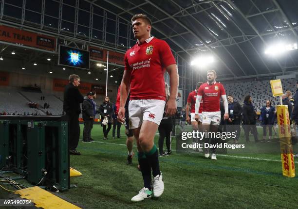 Dejected Owen Farrell of the Lions and teammates walk off the pitch following their 23-22 defeat during the 2017 British & Irish Lions tour match...