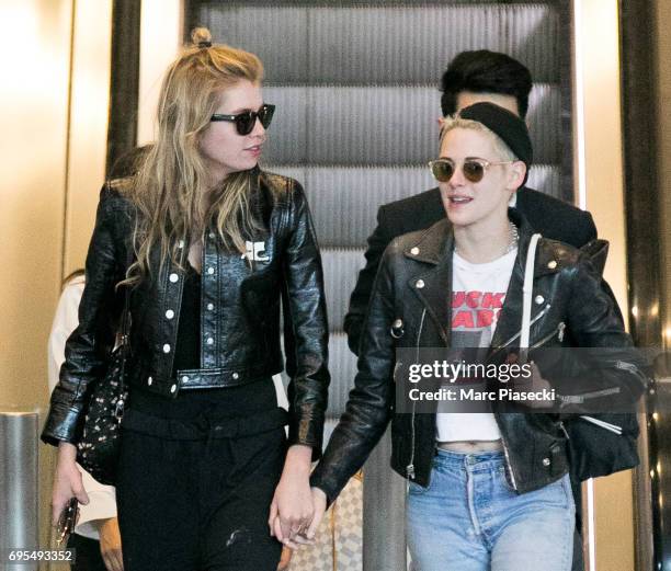 Model Stella Maxwell and actress Kristen Stewart are spotted at Charles-de-Gaulle airport on June 13, 2017 in Paris, France.