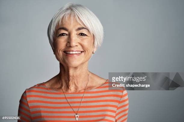 age is whatever you think it is! - old woman short hair stock pictures, royalty-free photos & images