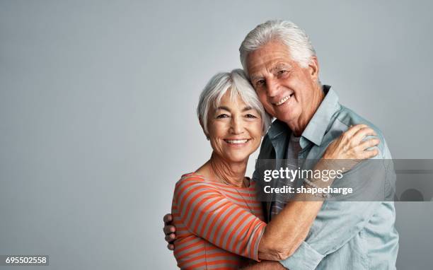 two but one in soul - senior couple smiling stock pictures, royalty-free photos & images