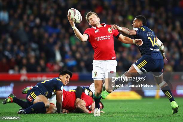 Dan Biggar of the Lions collects the ball during the match between the Highlanders and the British & Irish Lions at Forsyth Barr Stadium on June 13,...