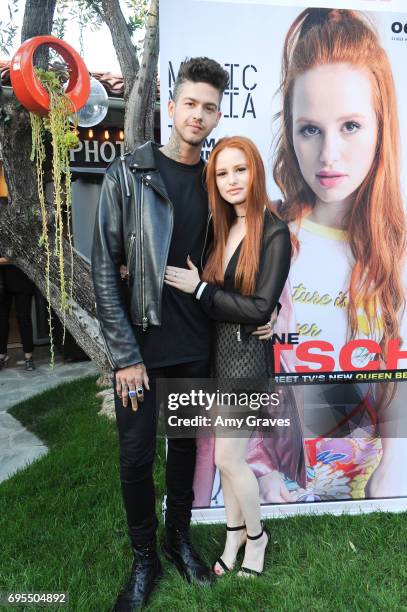 Travis Mills and Madelaine Petsch attends the Popular X Wildfox Cover Launch Event For Madelaine Petsch in Los Angeles on June 12, 2017 in Los...