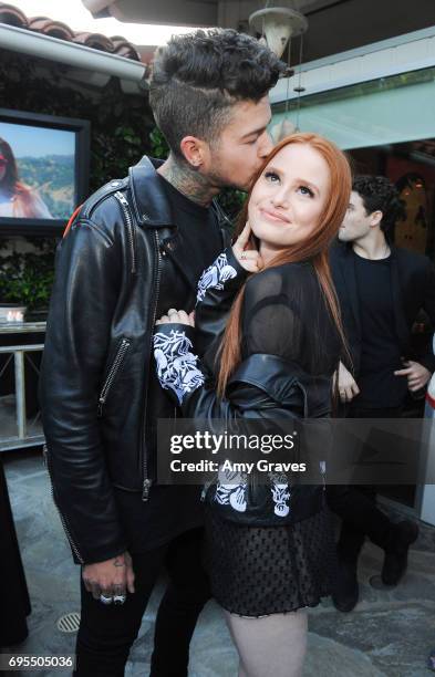 Travis Mills and Madelaine Petsch attends the Popular X Wildfox Cover Launch Event For Madelaine Petsch in Los Angeles on June 12, 2017 in Los...