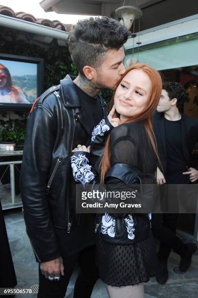 Travis Mills and Madelaine Petsch attends the Popular X Wildfox Cover Launch Event For Madelaine Petsch in Los Angeles on June 12, 2017 in Los...