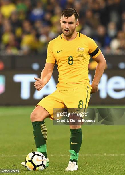 Bailey Wright of Australia passes the ball during the Brazil Global Tour match between Australian Socceroos and Brazil at Melbourne Cricket Ground on...