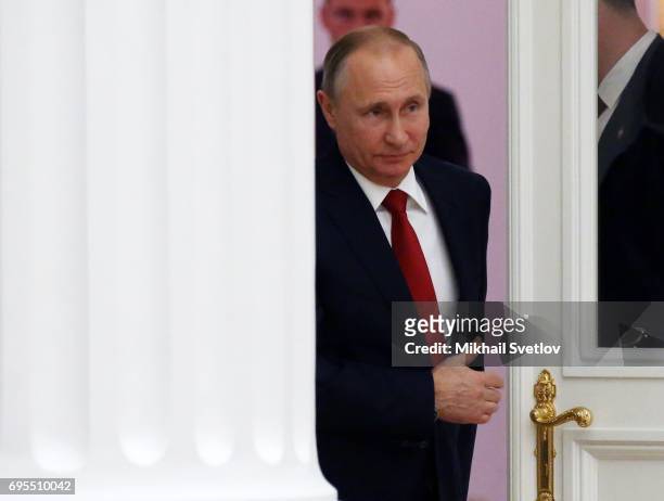 Russian President Vladimir Putin arrives to the meeting with children at the Kremlin Palace in Moscow, Russia, June 2017. Russian President Vladimir...