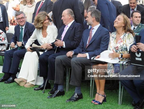 President of COTEC Foundation Cristina Garmendia King Juan Carlos and King Felipe VI of Spain attend COTECT event at Vicente Calderon Stadium on June...