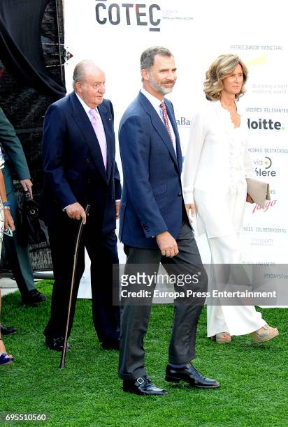 President of COTEC Foundation Cristina Garmendia King Juan Carlos and King Felipe VI of Spain attend COTECT event at Vicente Calderon Stadium on June...