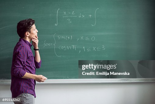 Student Tries To Solve A Math Problem High-Res Stock Photo - Getty Images