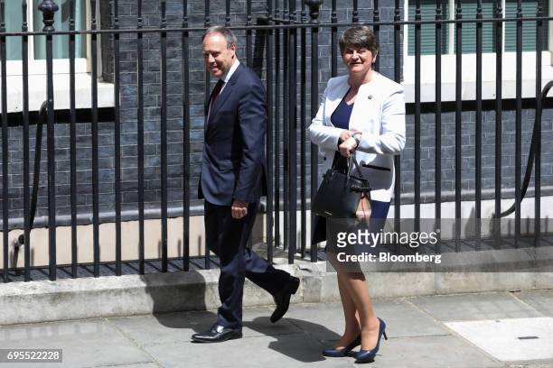 Arlene Foster, leader of the Democratic Unionist Party , right, and Nigel Dodds, deputy leader of the Democratic Unionist Party , arrive for a...