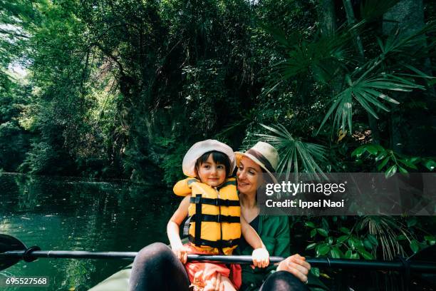 mother and her cute toddler girl kayaking together, saitama, japan - nagatoro stockfoto's en -beelden