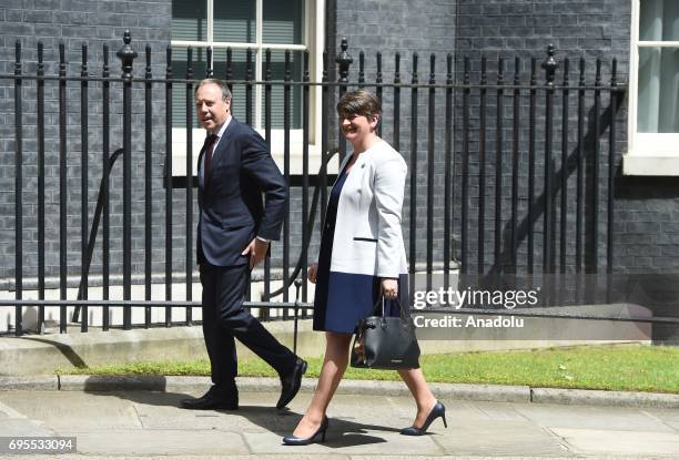 Democratic Unionist Party leader Arlene Foster and DUP Deputy Leader Nigel Dodds arrive at 10 Downing Street in central London, United Kingdom on...