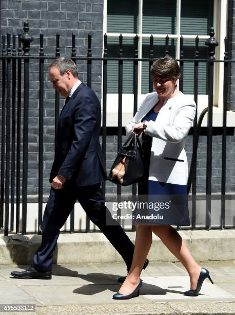 Democratic Unionist Party leader Arlene Foster and DUP Deputy Leader Nigel Dodds arrive at 10 Downing Street in central London, United Kingdom on...