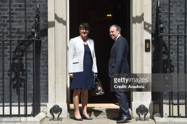Democratic Unionist Party leader Arlene Foster and DUP Deputy Leader Nigel Dodds arrive at 10 Downing Street in central London, United Kingdom on...