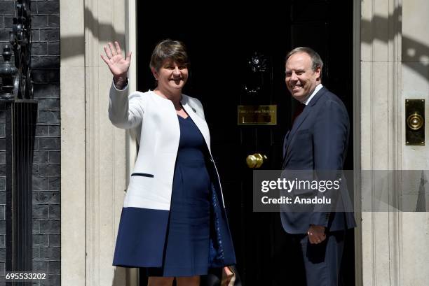 Democratic Unionist Party leader Arlene Foster and DUP Deputy Leader Nigel Dodds arrive at 10 Downing Street in central London, United Kingdom on...