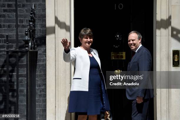 Democratic Unionist Party leader Arlene Foster and DUP Deputy Leader Nigel Dodds arrive at 10 Downing Street in central London, United Kingdom on...