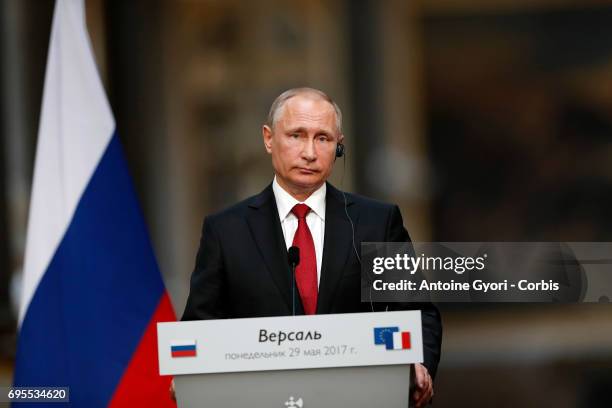 Russian President Vladimir Putin during a joint press with French President Emmanuel Macron at 'Chateau de Versailles' on May 29, 2017 in Versailles,...