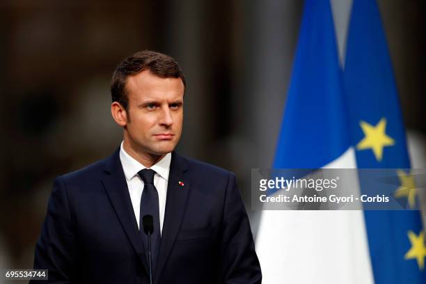 French President Emmanuel Macron during a joint press with Russian President Vladimir Putin at 'Chateau de Versailles' on May 29, 2017 in Versailles,...
