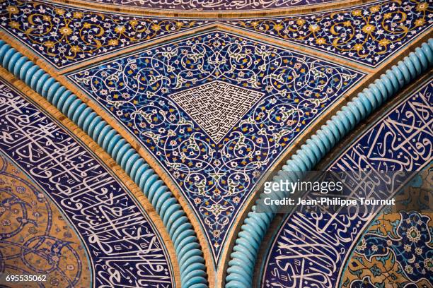 tilework on the walls of sheikh lotfollah mosque, isfahan, iran - isfahan stock pictures, royalty-free photos & images