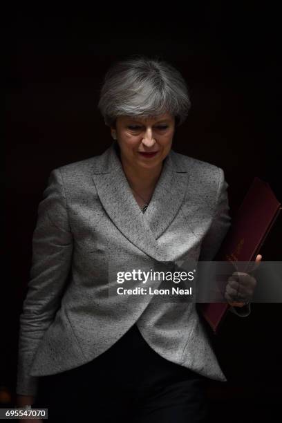 Prime Minister Theresa May leaves after meeting DUP leader Arlene Foster at 10 Downing Street on June 13, 2017 in London, England. Discussions...