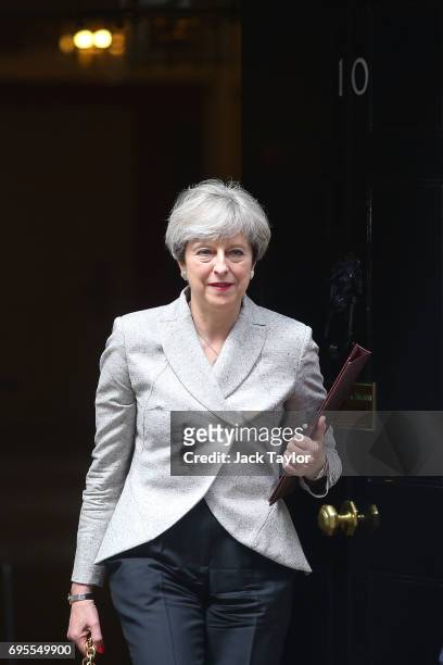 Prime Minister Theresa May leaves after meeting DUP leader Arlene Foster at 10 Downing Street on June 13, 2017 in London, England. Discussions...