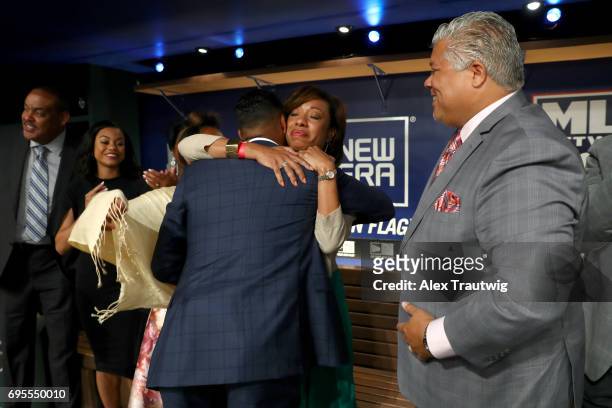 Hunter Greene hugs his mom after being selected second overall by the Cincinnati Reds during the 2017 Major League Baseball Draft at Studio 42 at the...