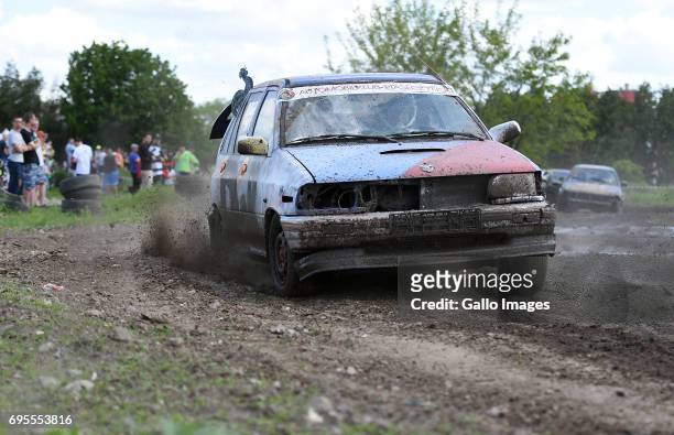 Wrecked cars participates in the XVI Mazowiecki Wrak Race on May 27, 2017 in Mysiadlo, Poland. During the race, the participants raced in wrecked...