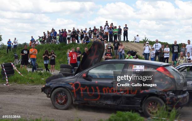 Wrecked cars participates in the XVI Mazowiecki Wrak Race on May 27, 2017 in Mysiadlo, Poland. During the race, the participants raced in wrecked...