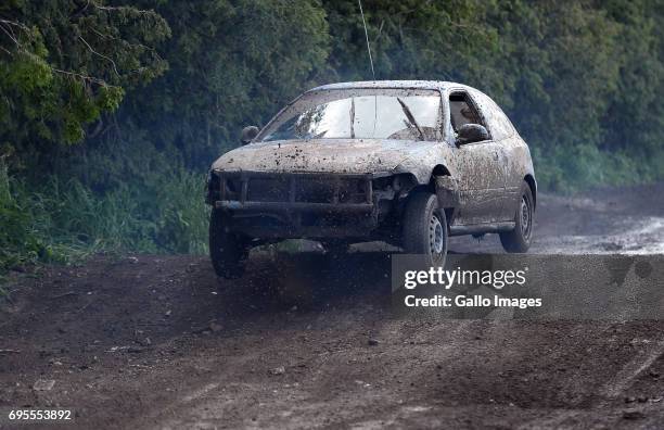 Wrecked cars participates in the XVI Mazowiecki Wrak Race on May 27, 2017 in Mysiadlo, Poland. During the race, the participants raced in wrecked...