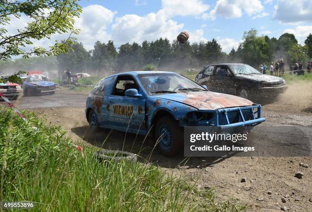 Wrecked cars participates in the XVI Mazowiecki Wrak Race on May 27, 2017 in Mysiadlo, Poland. During the race, the participants raced in wrecked...