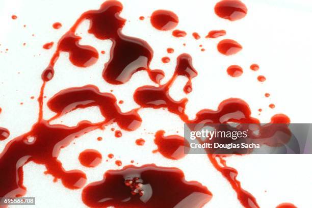 dripping blood on a white surface - testbild stock-fotos und bilder