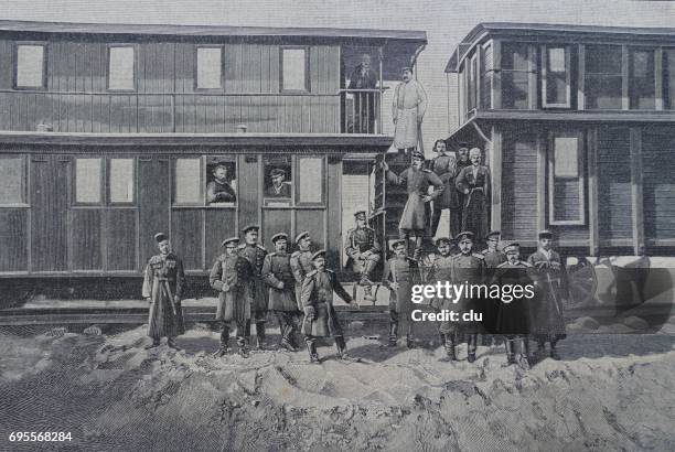 trans-caspian military railway with soldiers in front of it, 1898 - trans caspian railway stock illustrations